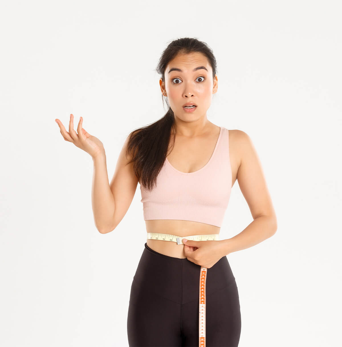 Woman holding measuring tape